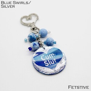 Cum Slut Purse Charm available in several colors Blue Swirls/Silver