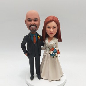 Customised couple bobbleheads, customised couple gifts, customised wedding bobbleheads, wedding couple cake toppers, couple anniversary gift