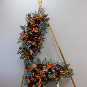 Burgundy dusty blue wedding arch swag, orange ceremony arch, flower backdrop, rust wedding decor