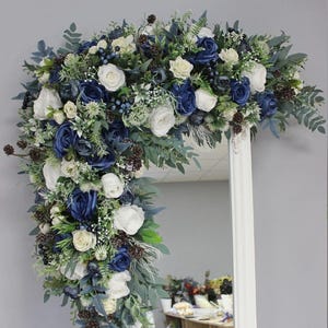 Navy white arch flowers with pines, Winter wedding arch swag, Wedding arbor decor