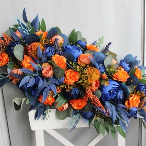 Burnt orange navy blue arch swag, Floral arch flowers, Wedding decor