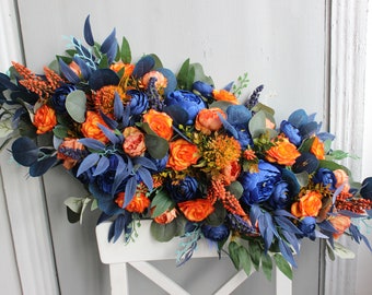Burnt orange navy blue arch swag, Floral arch flowers, Wedding decor