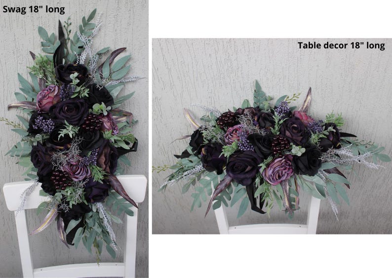 May include: An 18-inch long floral swag and table decor. The arrangement features black and purple roses, berries, and greenery. Accents include silver and gold-toned elements, creating a dramatic and elegant aesthetic. The swag is displayed on a white chair.