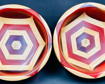 Matching hexagon bowls made with red oak and red resin