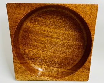 Mahogany turned bowl with square edges.