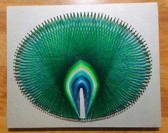 Oval string art peacock colors