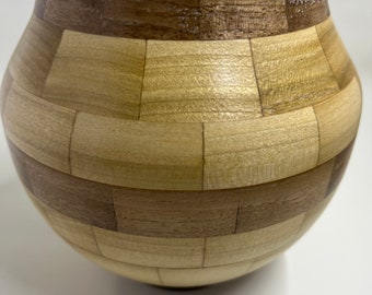 Small handmade woodturned vase made from poplar and walnut.