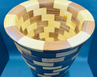 Eight layered segmented bowl that can be used as a planter or a great conversation piece at the dining table.