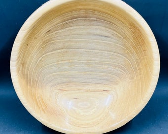 Homemade hickory bowl turned on a lathe