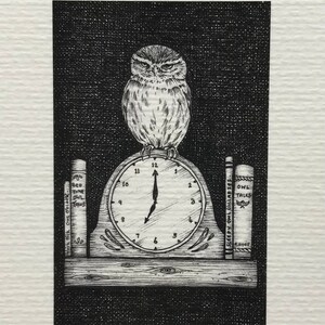 May include: A black and white illustration of an owl perched on a clock with the text "Owl O'clock" and "15/100" below the clock. The owl is looking to the left and has a serious expression. The clock has Roman numerals and the hands are pointing to 12 o'clock. There are two books on either side of the clock, one titled "Bed Time Owl Tales" and the other titled "Sleepy Owl Lullabies".