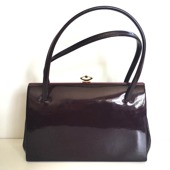 burgundy patent leather bag