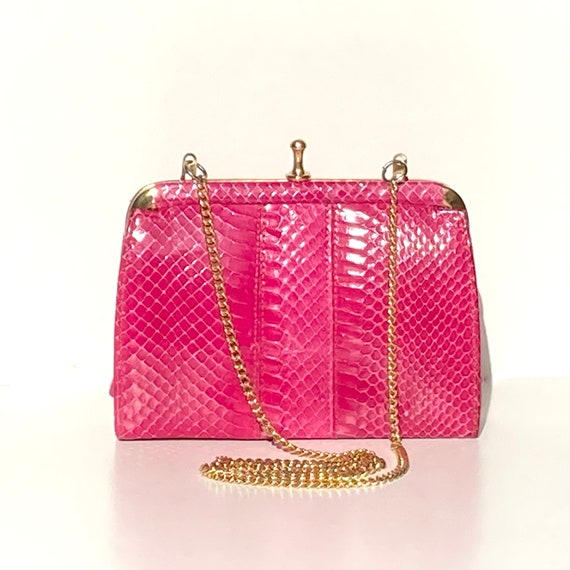 Pink snakeskin clutch bag hotsell