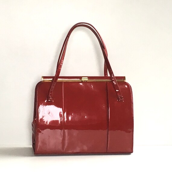 red patent leather purse