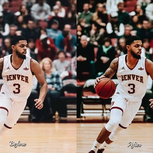 May include: A basketball player wearing a white jersey with the word "DENVER" and the number "3" in maroon. The player is dribbling a basketball with a brown leather surface. The player is on a basketball court with a wooden floor.