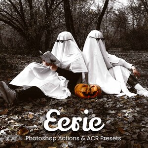 May include: Two figures dressed in white sheets, resembling ghosts, sit in a forest setting. One figure holds a book and the other sits with a carved pumpkin. The text "Eerie" is written in a stylized font below the figures, with the words "Photoshop Actions & ACR Presets" below that.