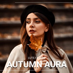May include: A woman with long brown hair wearing a black beret and a beige coat holds a brown leaf in front of her face. The text "LUTS FILTERS AUTUMN AURA" is visible in the image.