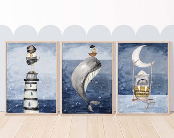 May include: Set of three watercolor prints featuring nautical themes. The first print shows a seagull wearing a captain's hat standing on a lighthouse. The second print shows a whale with a small boat on its back. The third print shows a walrus wearing a captain's hat swinging on a crescent moon.