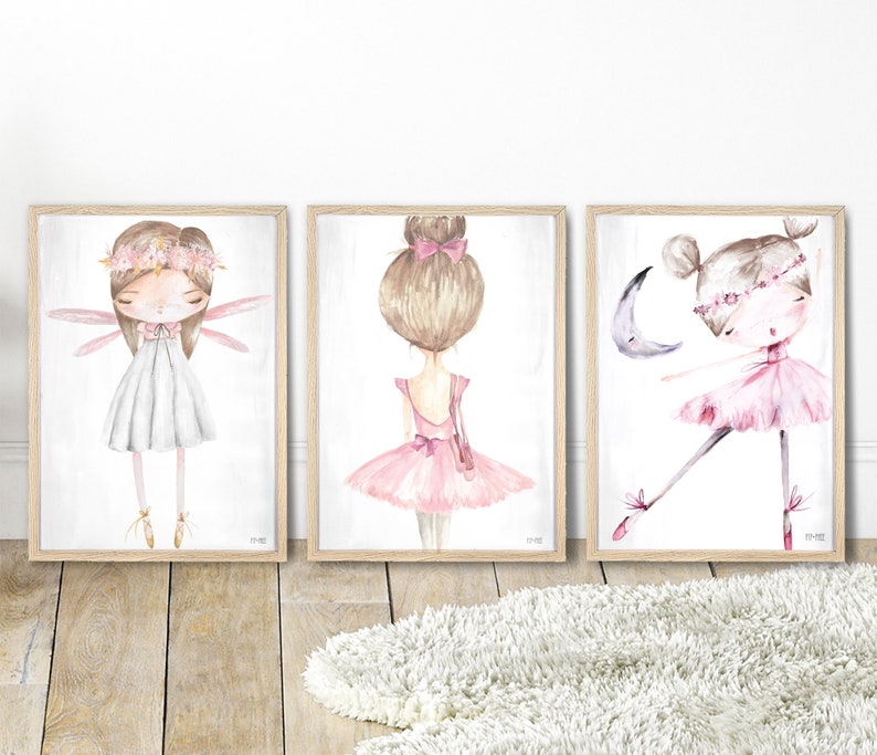 May include: Three watercolor paintings of ballerinas in pink and white dresses. The ballerina on the left has wings and a flower crown. The ballerina in the middle has a bun and a pink ribbon. The ballerina on the right is wearing a pink tutu and has a crescent moon behind her.