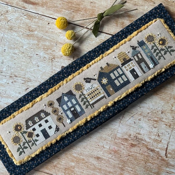 A Honey of a Town Tiny Town Counted Cross Stitch Pattern by Heart in Hand with embellishments