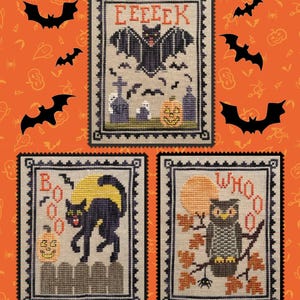 May include: Three cross-stitch designs with a Halloween theme. The top design features a bat and the word "EEEK". The second design shows a black cat and the word "BOO". The third design shows an owl and the word "WHO".