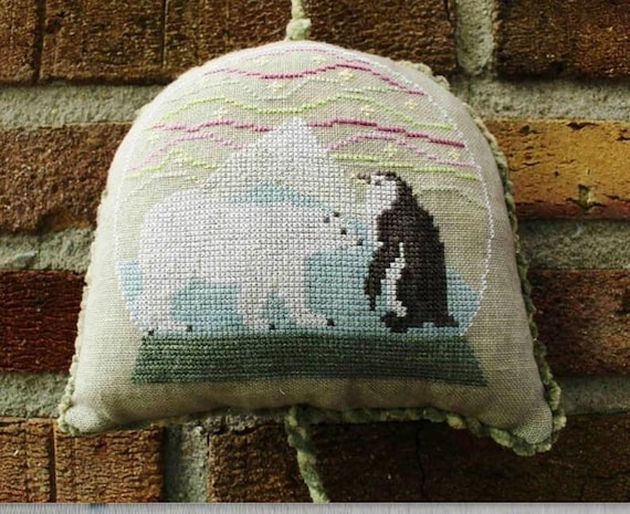 Pole to Pole snowglobe Counted Cross Stitch Pattern by Thistles # 2014 designed by Liezbeth Gottschall