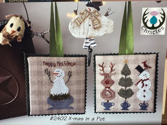 X-Mas in a Pot Counted Cross Stitch Pattern by Thistles # 2402 designed by Liezbeth Gottschall