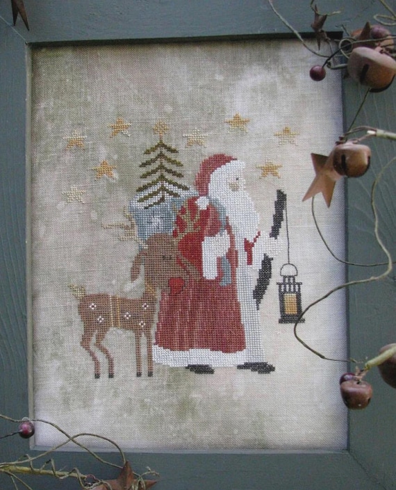 Father Winter Counted Cross Stitch Pattern by Thistles # 1727 designed by Liezbeth Gottschall