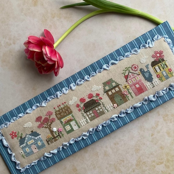 Blooming Tiny Town Counted Cross Stitch Pattern by Heart in Hand with embellishments