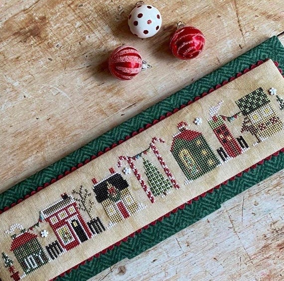 Christmas Tiny Town Counted Cross Stitch Pattern by Heart in Hand with embellishments