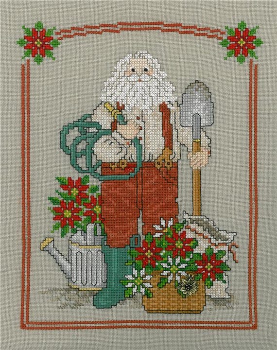 Poinsettia Santa by Sue Hillis Designs Counted Cross Stitch Pattern with Charm L230 - Printed Pattern
