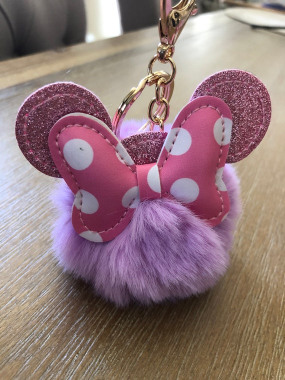 Make your own puffy flower keychain easily with this pom pom maker