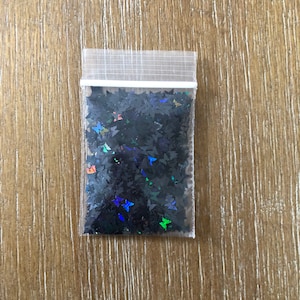 77# Iridescent Black Butterfly glitter 1tsp