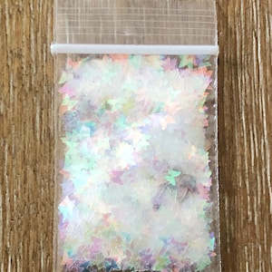 131# Clear iridescent Butterfly glitter 1tsp