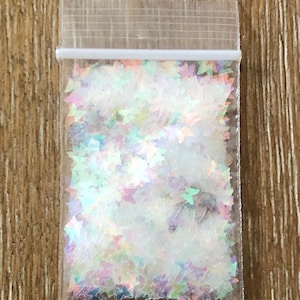 131# Clear iridescent Butterfly glitter 1tsp