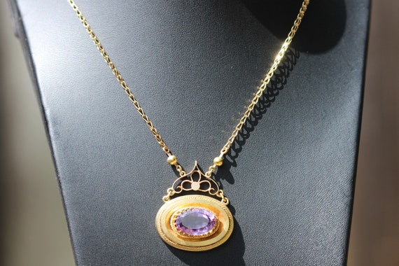 Victorian 15ct amethyst pendant, with a modern 9ct