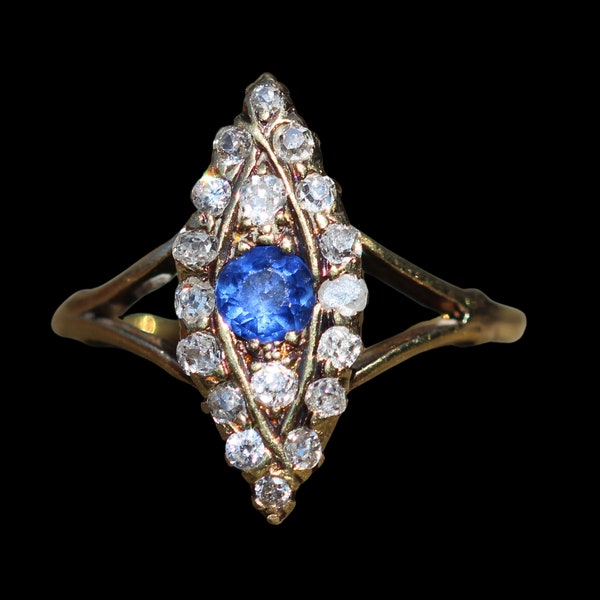 Early 20th century 18ct sapphire and diamond navette ring