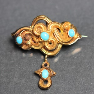 Victorian 9ct turquoise ribbon brooch