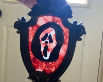 Small framed glass painted ghost face from scream