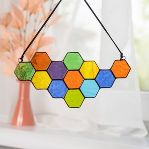 Handmade rainbow honeycomb suncatcher made of stained glass