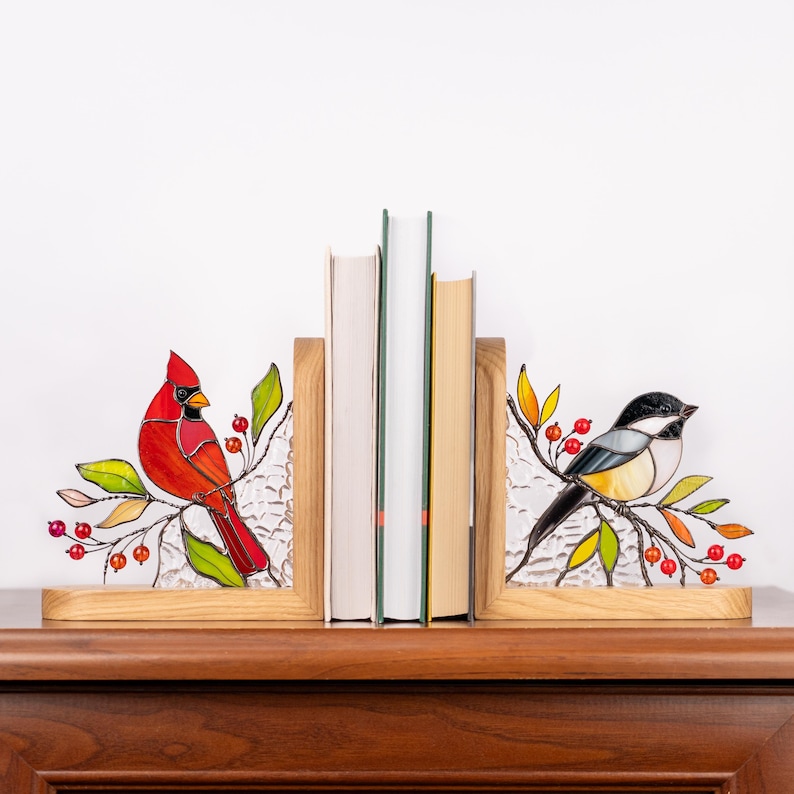 Bookend with stained glass bird and orange-red bead accents.