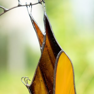 Halloween Bat Hanging on a copper branch