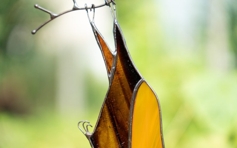 Halloween Bat Hanging on a copper branch