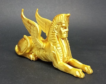 De sfinx van de tijdmachine uit de boekomslag van H.G. Wells