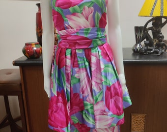 Dominex années 1980 robe de cocktail bustier à basque rose fuchsia