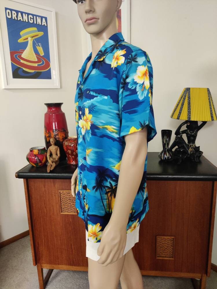 blue and yellow hawaiian shirt