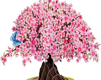 May include: A 3D pop-up card featuring a pink cherry blossom tree with a blue butterfly. The tree has a brown trunk and green leaves. The card is perfect for a spring or birthday greeting.