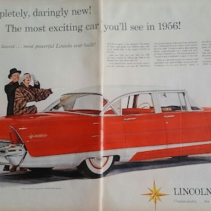 May include: A red 1956 Lincoln car with white trim. The car is parked on a white background. The car is being driven by a man and a woman. The text "Completely, daringly new! The most exciting car you'll see in 1956! Longest... lowest... most powerful Lincoln ever built!" is printed on the page. The text "LINCOLN FOR 1956 Unmistakably... the finest in the fine car field" is printed on the page.