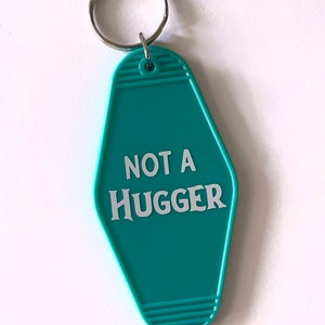 MADE TO ORDER Not a Hugger Vintage Style Keychain
