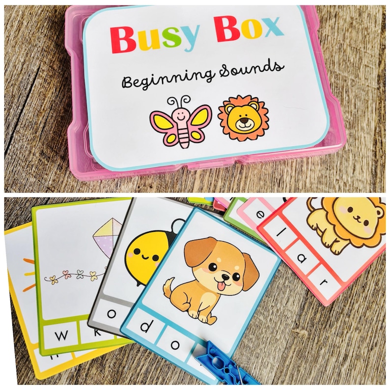 Puede incluir: Una caja de pl&aacute;stico rosa con la etiqueta "Busy Box Beginning Sounds" y tarjetas coloridas con ilustraciones de una mariposa, un le&oacute;n, una cometa, una abeja y un cachorro. Las tarjetas tienen letras e im&aacute;genes para el aprendizaje temprano.