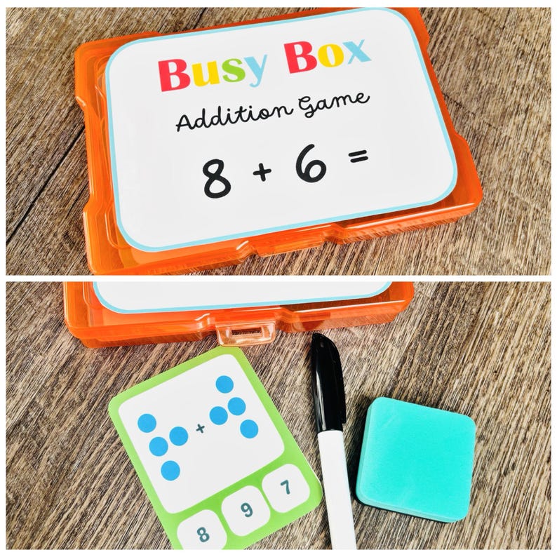 Puede incluir: Un juego de suma Busy Box naranja. El juego incluye tarjetas con problemas de suma, una tarjeta verde con puntos, un marcador negro y un peque&ntilde;o borrador turquesa. La tarjeta superior muestra el problema 8 + 6 =.
